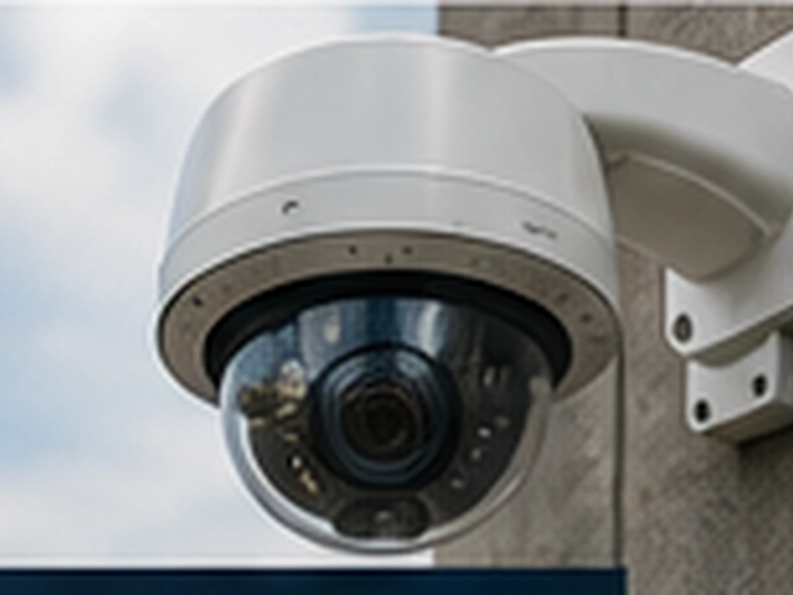 Commercial CCTV camera representing monitored security services.